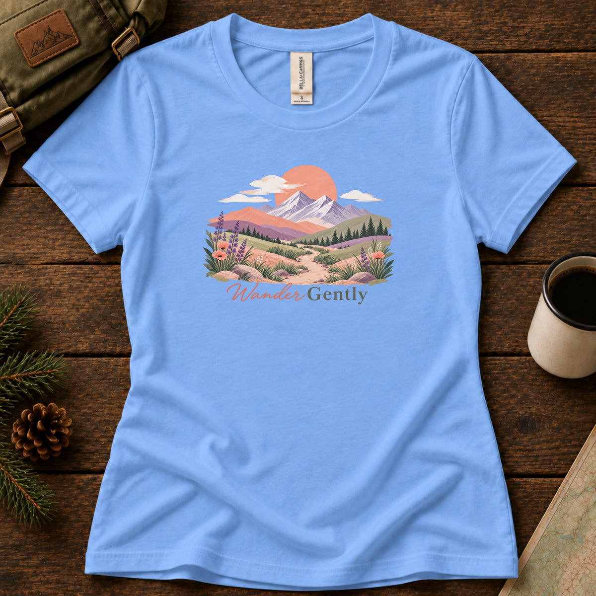 Wander Gently women's graphic tee in Carolina Blue, Sasquatch Hiking Society.