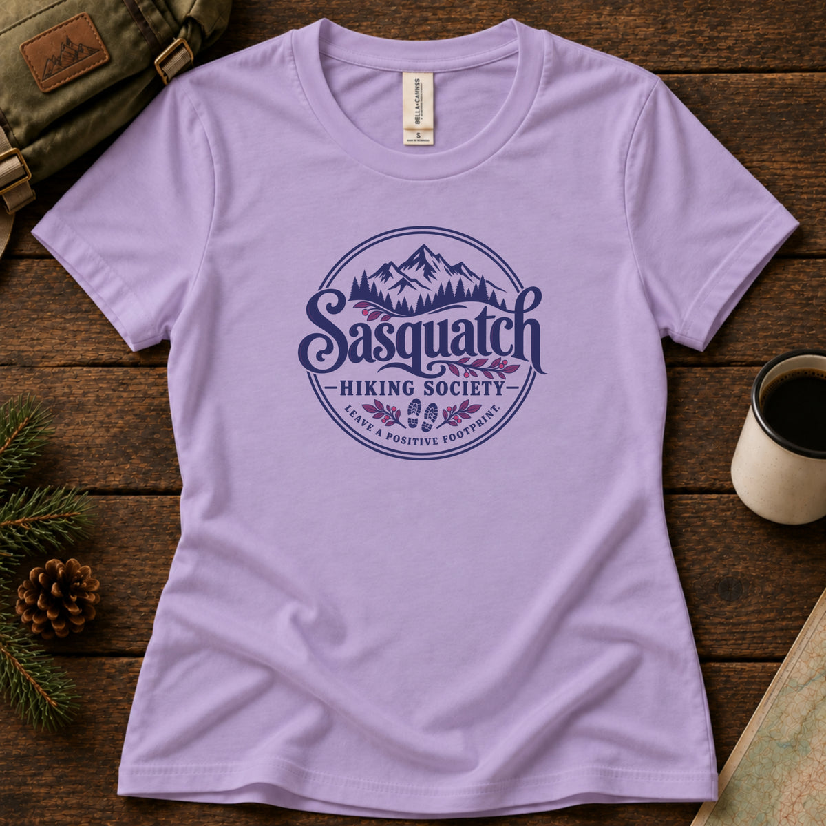 Positive Footprint women's graphic tee in Dark Lavender, Sasquatch Hiking Society.