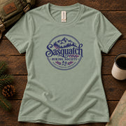 Positive Footprint women's graphic tee in Sage, Sasquatch Hiking Society.