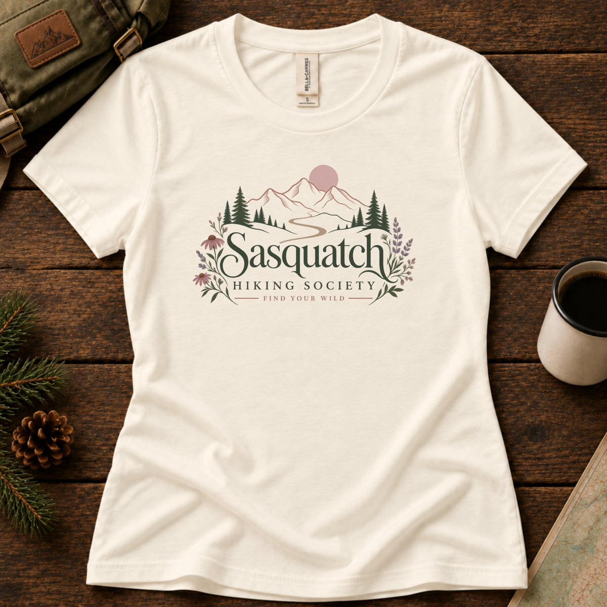 Wildflower Way women's graphic tee in Natural, Sasquatch Hiking Society.