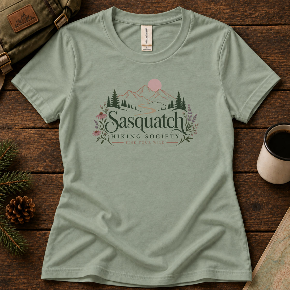 Wildflower Way women's graphic tee in Sage, Sasquatch Hiking Society.