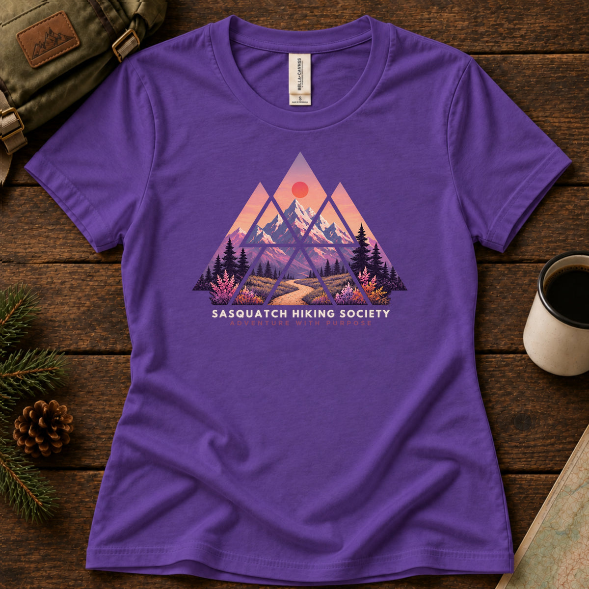 Adventure with Purpose women's graphic tee in Team Purple, Sasquatch Hiking Society.